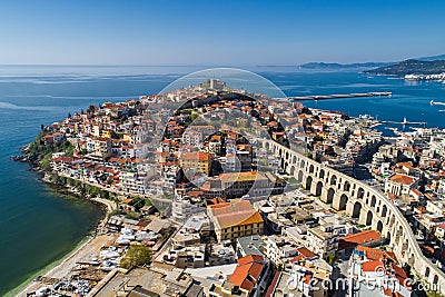 Aerial view the city of Kavala in northern Greek, ancient aqueduct Kamares, homes and medieval city wall Stock Photo