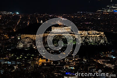 Aerial view of cityscape Athens surrounded by buildings in night Stock Photo