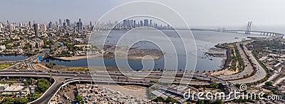 Aerial view of cityscape Mumbai surrounded by buildings and water Stock Photo