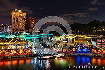 Aerial view of Clarke Quay riverside at night in Singapore waterfront skyline. Clarke Quay is popular attraction for traveler in Editorial Stock Photo