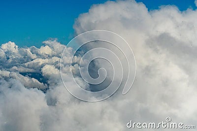 Aerial view of clouds outside my airplane window Stock Photo