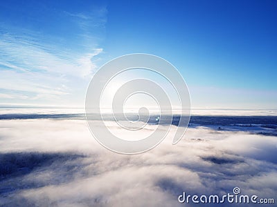 Aerial view clouds over forest during winter colors. Aerial view of forest and clouds. Coastline. Aerial drone view of the forest. Stock Photo