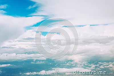 Aerial view cloudscape from the plane of fluffy rain cloud in daytime Stock Photo