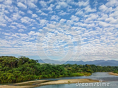 Aerial view of the cloudy sky over the Amazona rainforest in Tena, Ecuador Stock Photo