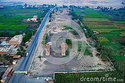 Aerial view of the Colossi of Memnon, Two massive stone statues of theï¿½Pharaohï¿½Amenhotep III Stock Photo