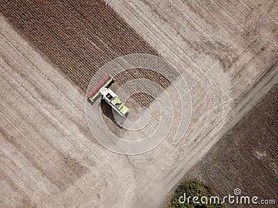 Aerial view on Combine harvesting genetically modified soya bean Stock Photo