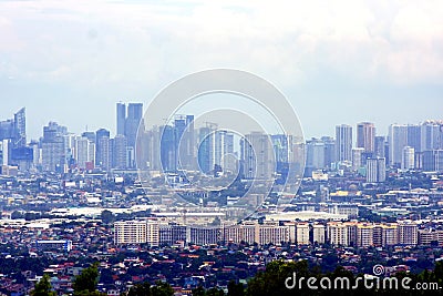 An aerial view of commercial and residential buildings and establishments in the towns of Cainta, Taytay, Pasig, Makati and Taguig Editorial Stock Photo