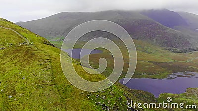 Aerial view from Connor Pass over a valley at Dingle Peninsula Stock Photo