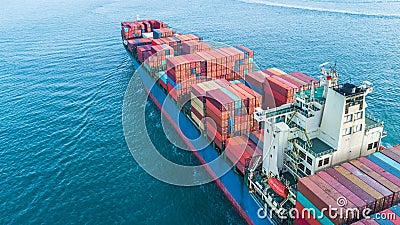 Aerial view container cargo ship, business freight shipping international by container cargo ship in the open sea. Stock Photo