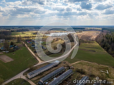 aerial view of country roads and small village with houses and lake Stock Photo