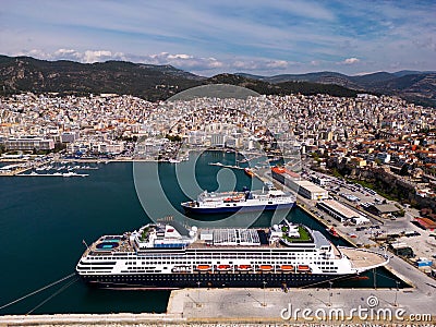 Aerial view cruise ship in port of Kavala. Visitors can enjoy breathtaking panoramas of the city's colorful Editorial Stock Photo