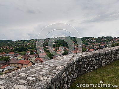 Aerial view of Doboj hilly suburbs from medieval fortress Gradina during overcast summer day Editorial Stock Photo