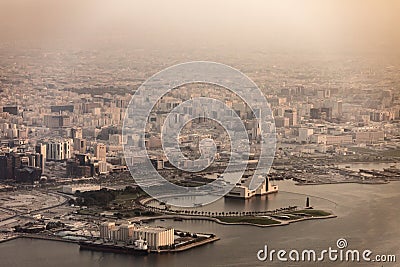 Aerial view of Doha, Qatar and harbor with haze and dust Stock Photo