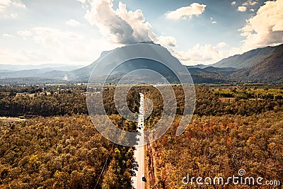 Aerial view of Doi Luang Chiang Dao mountain with the road among the autumn forest on bright day at Chiang Dao Stock Photo