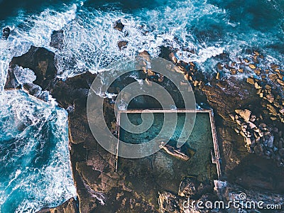 Aerial view of waves around Curl Curl rock pool Stock Photo