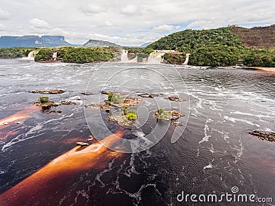 Aerial view of El Hacha waterfall at sunrise. Stock Photo