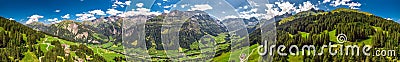 Aerial view of Elm village and Swiss mountains - Piz Segnas, Piz Sardona, Laaxer Stockli from Ampachli, Glarus, Switzerland, Europ Stock Photo