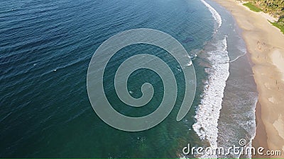 Aerial view of an emerald green sea and big foaming waves. Indian Ocean. Dikwella beach. Sri Lanka Stock Photo
