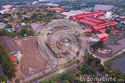 Aerial view of factory industry with smoke and toxic air from chimney in energy and pollution environment concept with city town Stock Photo