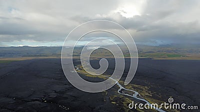 Aerial view of fantastic landscapes in Iceland with narrow rivers and mountains in the background Stock Photo