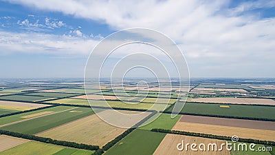 Aerial view of fields with various types of agriculture, against cloudy sky Stock Photo