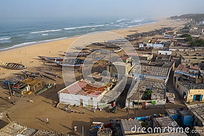Aerial view of fishing village, pirogues fishing boats in Kayar, Senegal. Photo made by drone from above. Africa Landscapes Editorial Stock Photo