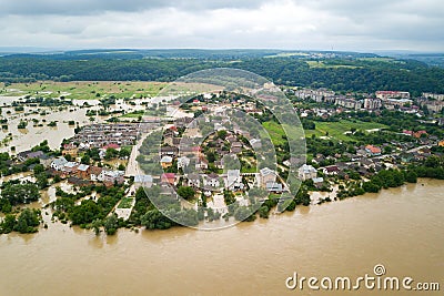 Aerial view of flooded houses with dirty water of Dnister river in Halych town, western Ukraine Stock Photo