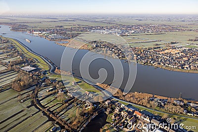 Aerial view Dutch river Lek with view at village Schoonhoven Stock Photo