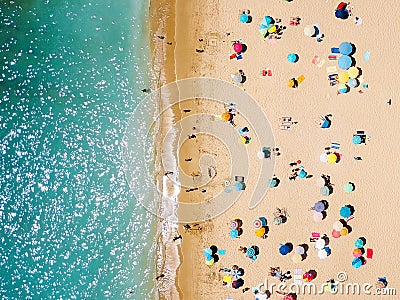 Aerial View From Flying Drone Of People Crowd Relaxing On Beach Stock Photo