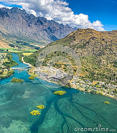 Aerial view of Frankton Arm valley New Zealand with majestic mountain peaks and turquoise water of Frankton Arm. Stock Photo