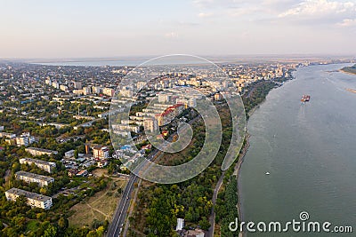 Aerial view of Galati City, Romania. Danube River near city with sunset warm light Stock Photo