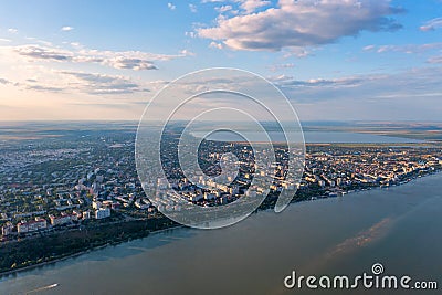 Aerial view of Galati City, Romania. Danube River near city with sunset warm light Stock Photo