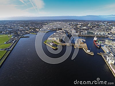 Aerial view on the Galway city commercial port and the Long Walk. Editorial Stock Photo