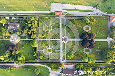 Aerial view Gardens of czech historical town Cesky Krumlov. UNESCO World Heritage Site in beautiful golden morning light Stock Photo