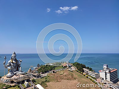 An aerial view of giant 123 feet shiva statue with an ocean background Editorial Stock Photo