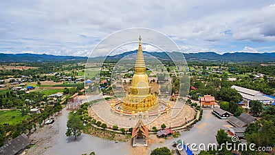 Aerial view Golden Pagoda Sri Vieng Chai Of Phra Phutthabat Huai Tom Temple Lamphun, Thailand Stock Photo