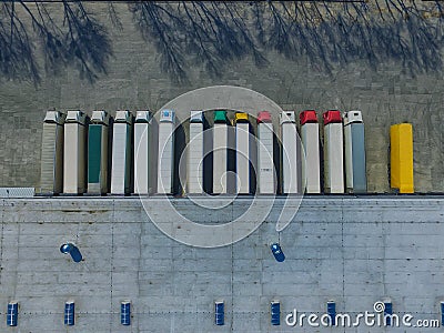 Aerial view of goods warehouse. Logistics center in industrial city zone from above. Stock Photo