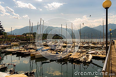 Aerial view of group of empty docked boats in Lake Como in Italy Editorial Stock Photo