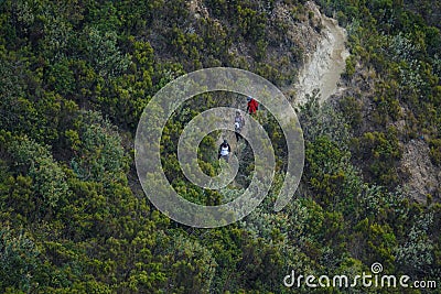 Aerial view of a group of hikers in the mountains Stock Photo
