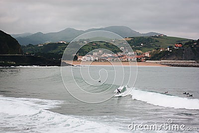 Aerial view of a group of surfers in the ocean on the Cote Basque Editorial Stock Photo