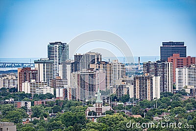 Aerial view of Hamilton skyline in Canada with old buildings and skyscrapers and church in middle Stock Photo