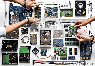 Aerial view of hands with computer electronics parts on white background Stock Photo