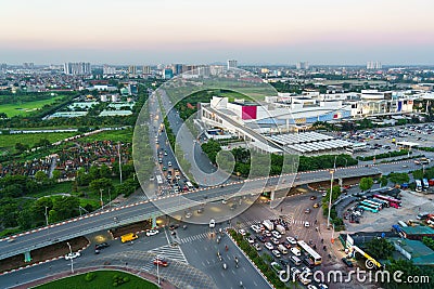 Aerial view of Hanoi skyline cityscape at sunset time at intersection Vinh Tuy bridge - Long Bien - Xuan Quan street Stock Photo