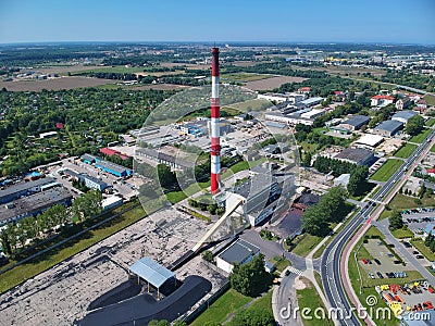 Aerial view on high brick chimney in power plant Stock Photo