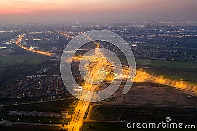 Aerial view of highway junctions. Bridge roads shape number 8 or infinity sign in structure of architecture concept. Top view. Stock Photo