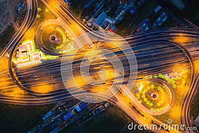 Aerial view of highway junctions Top view of Urban city, Bangkok at night, Thailand. Light trails across road junction, traffic Stock Photo