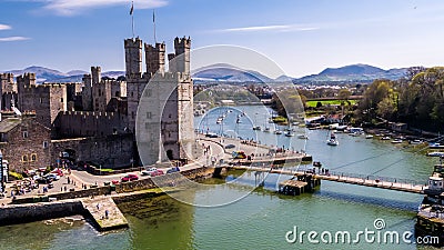 Aerial view of the historic castle Caernafon, Gwynedd in Wales - United Kingdom Editorial Stock Photo