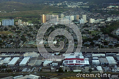 Aerial view of the Honolulu Highway, Car Rental Buildings, Golf Course, and Moanalua Comminuty Editorial Stock Photo