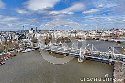 Aerial view of Hungerford Bridge and Golden Jubilee Bridges over the River Thames in London, England, UK Editorial Stock Photo