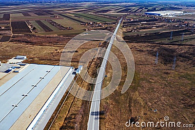 Aerial view of industrial estate surrounded by cultivated field Stock Photo